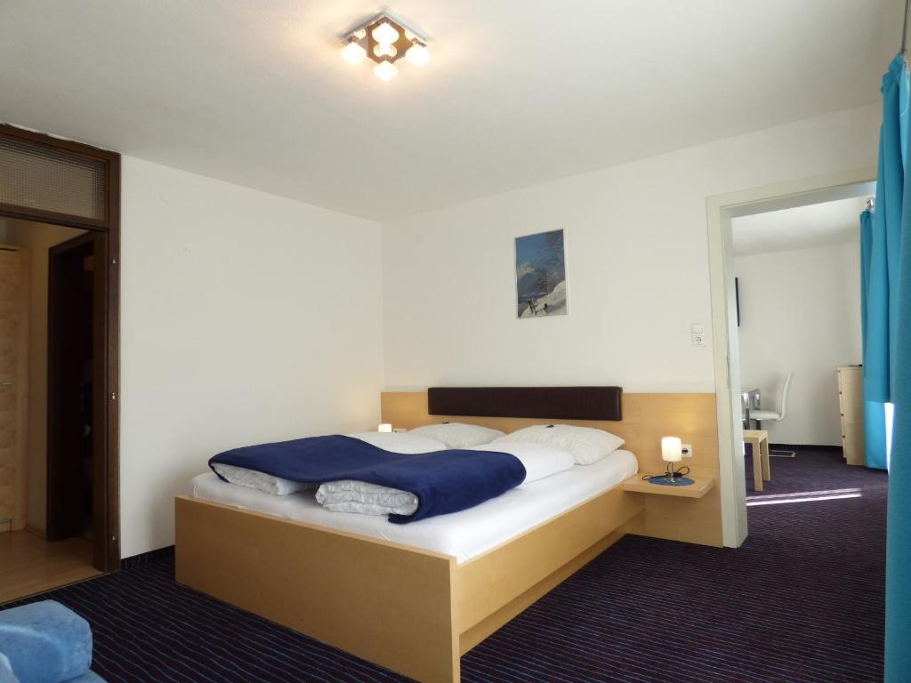 Panoramahotel Sankt Johann in Tirol Pokoj fotografie