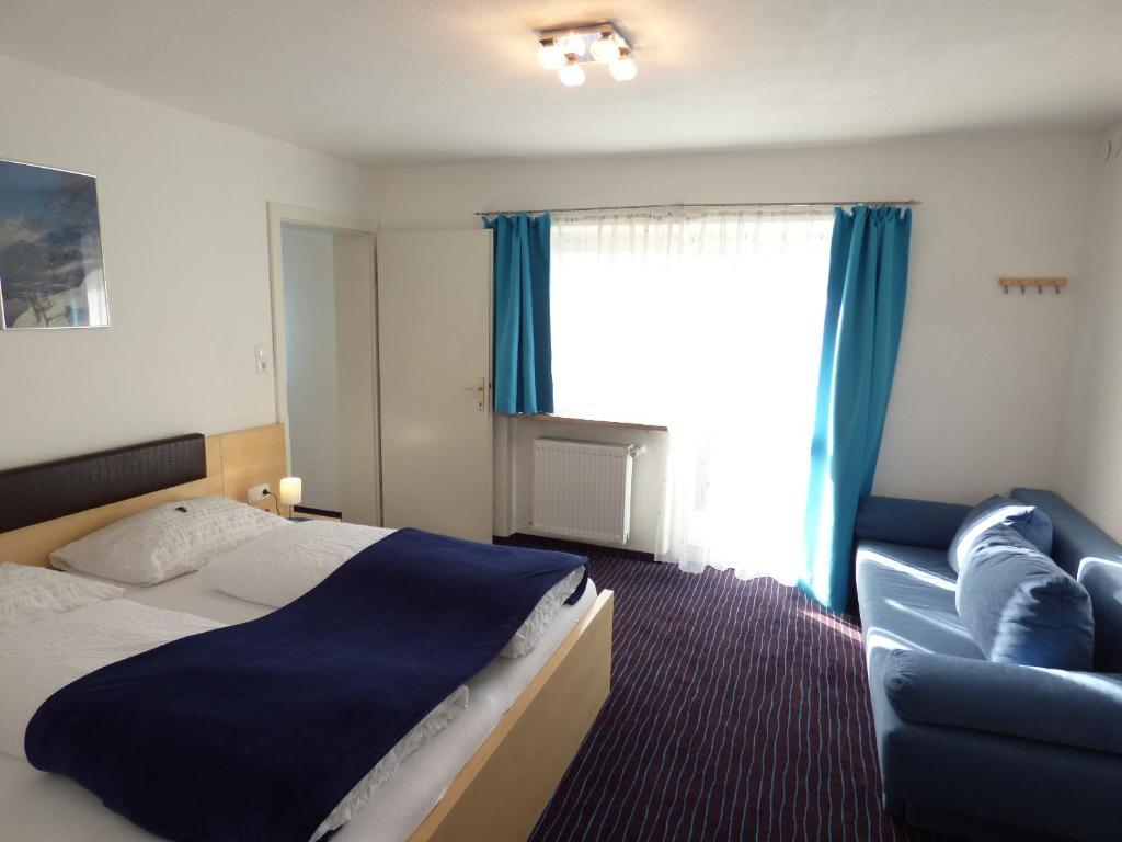 Panoramahotel Sankt Johann in Tirol Pokoj fotografie